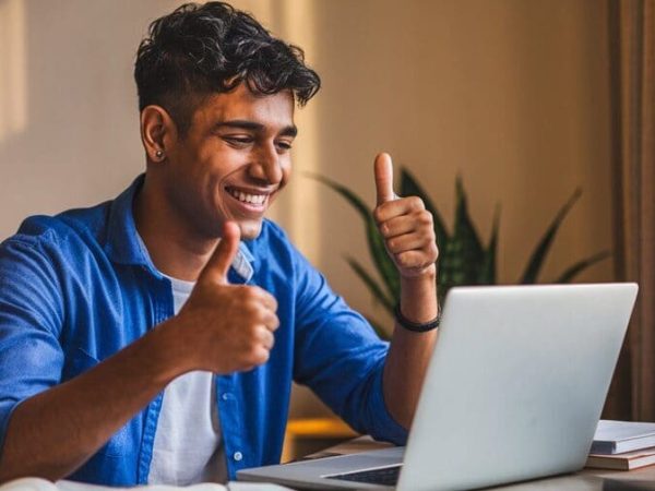 Happy-with-the-result-student-rotated Happy-with-the-result-student-rotated